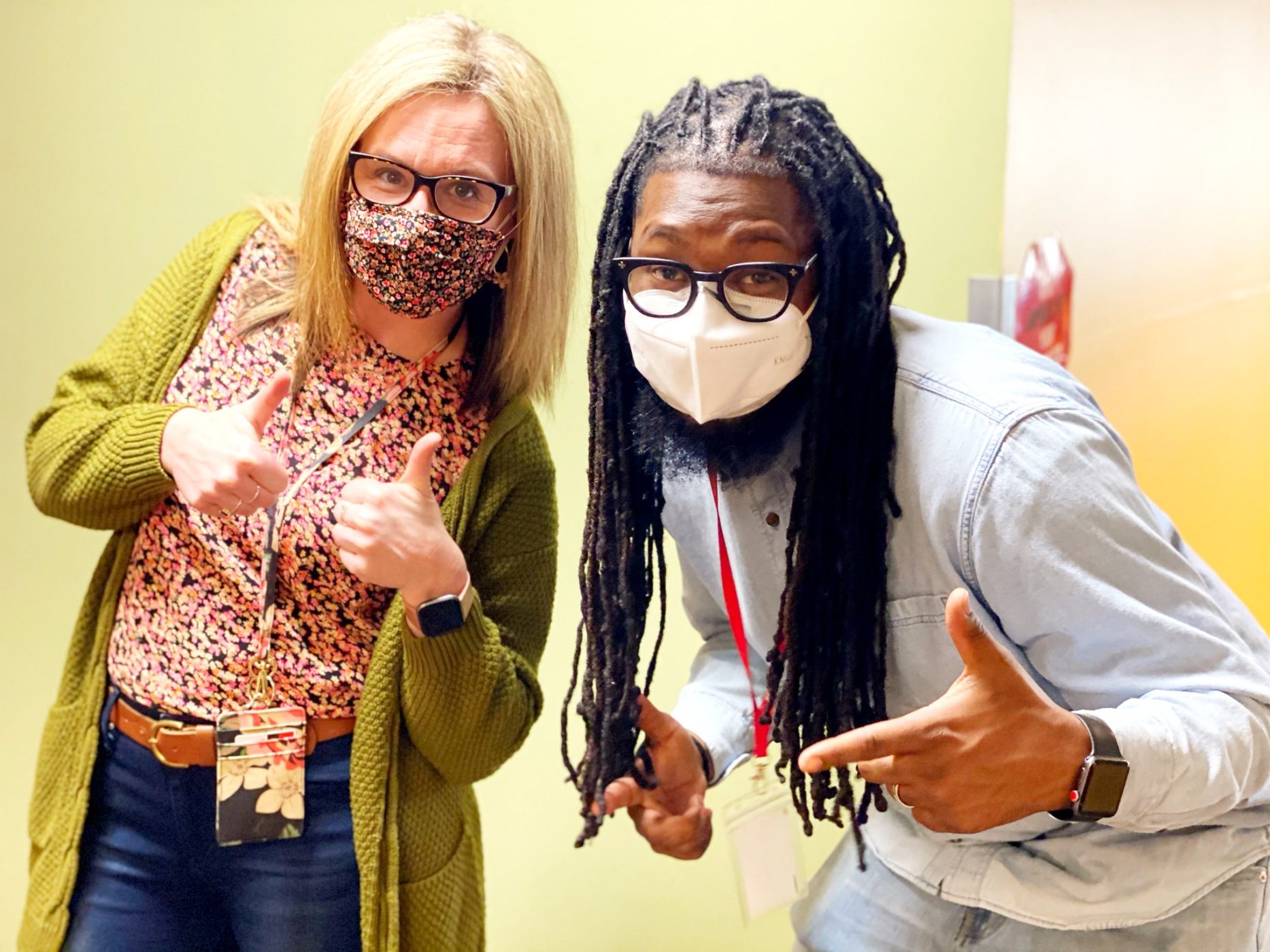 U Prep teachers wearing masks, expressing their enthusiasm for education, even during COVID. 